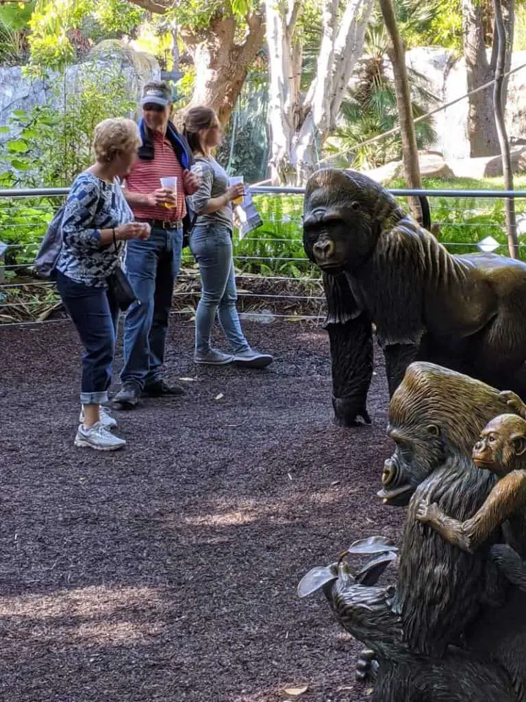 San Diego Zoo visitors at the Western Lowland Gorilla habitat life-size statues.