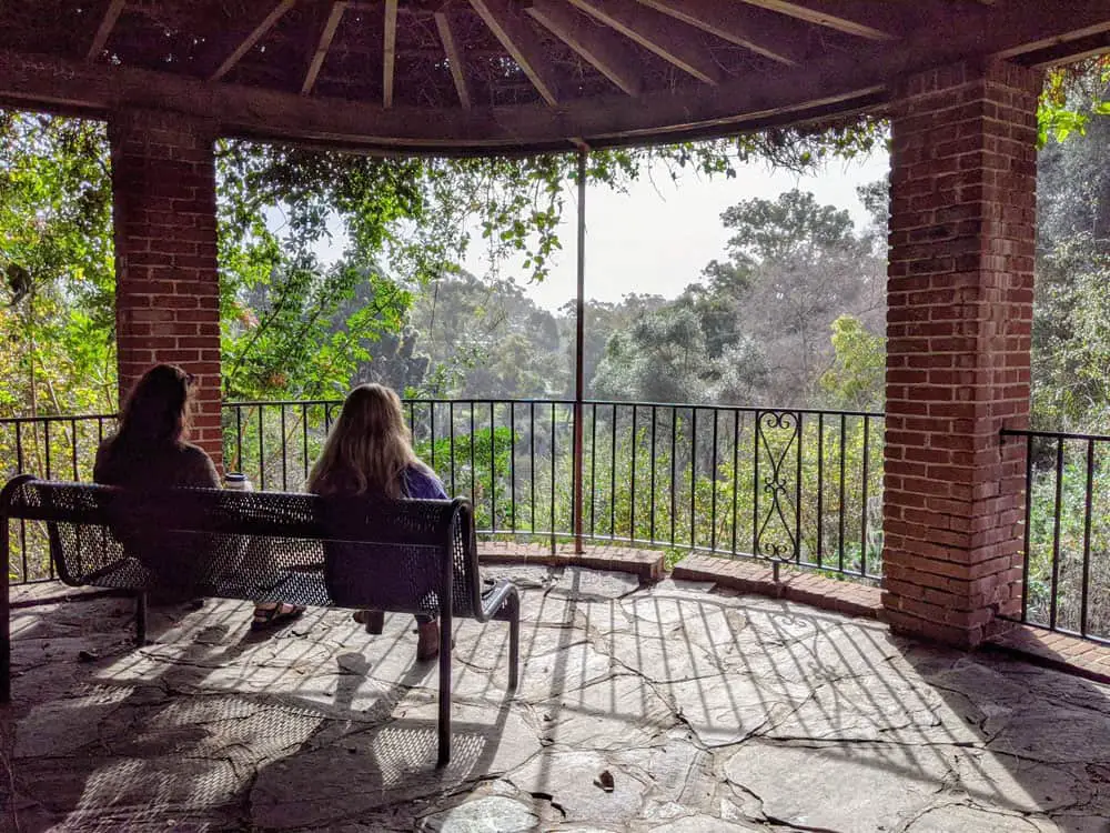 Photo of the interior of the Marston House pergola in Balboa Park looking out over Balboa Canyon and 163 freeway.